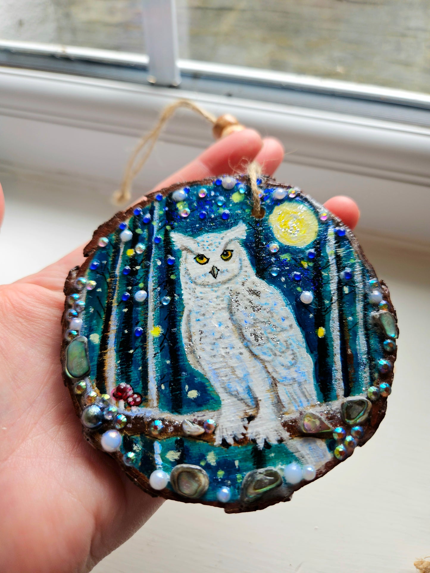This handpainted snowy owl sitting under the moon and night sky/whimsical home decor creation/wood slice painting for animal/nature lover/unique new home gift