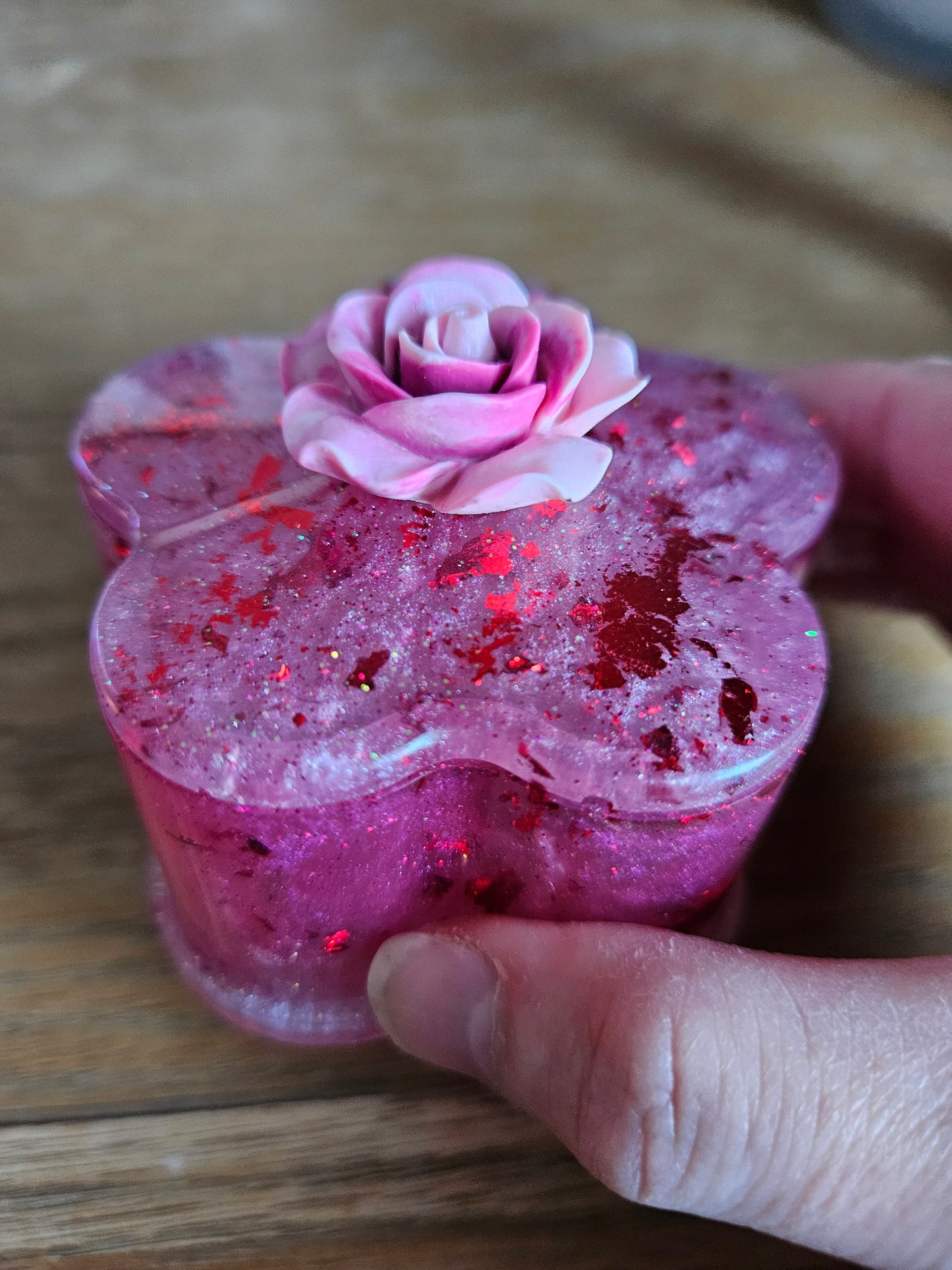 Flower shaped trinket box with rhinestones and arcylic flowers.