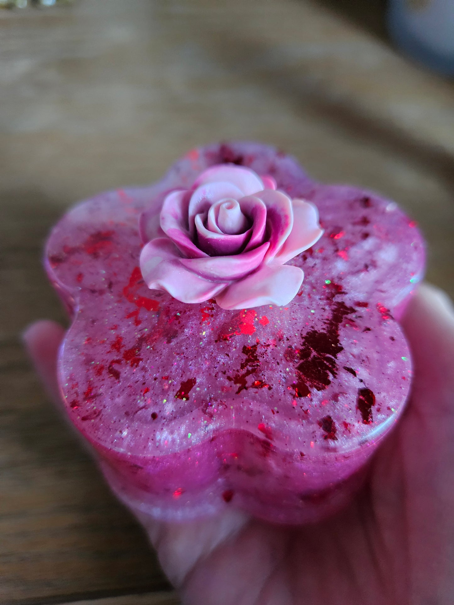 Flower shaped trinket box with rhinestones and arcylic flowers.