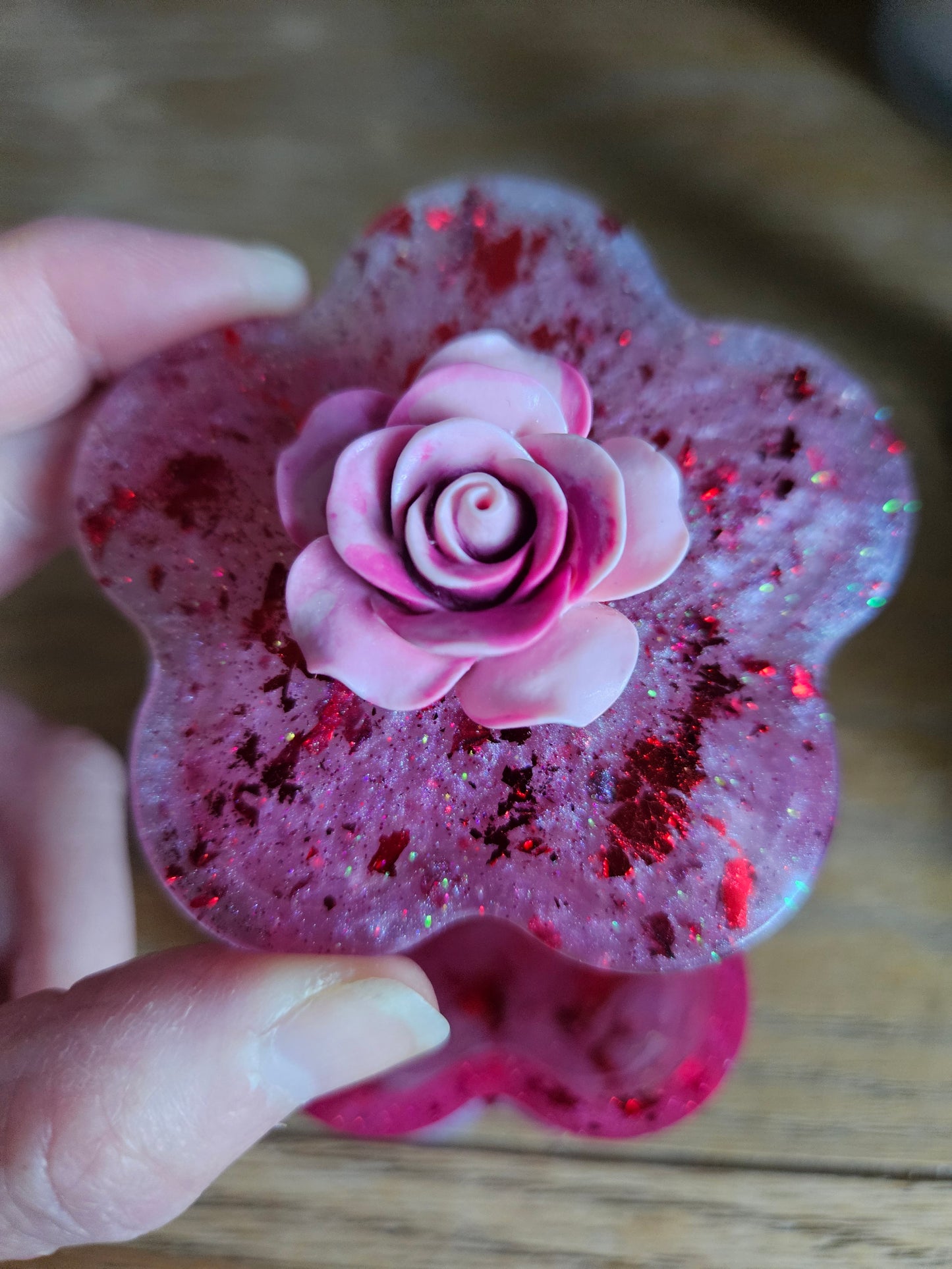 Flower shaped trinket box with rhinestones and arcylic flowers.