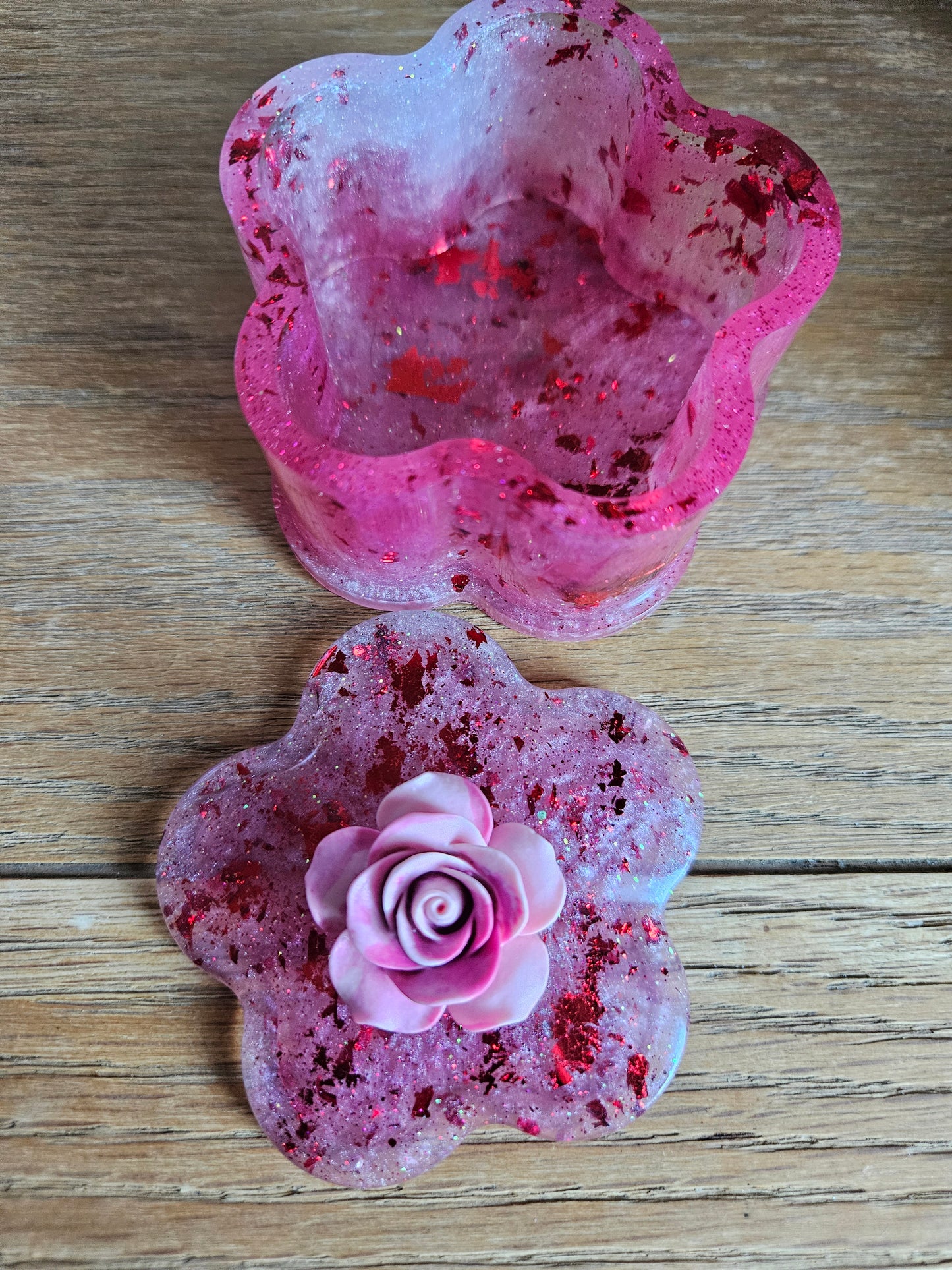 Flower shaped trinket box with rhinestones and arcylic flowers.