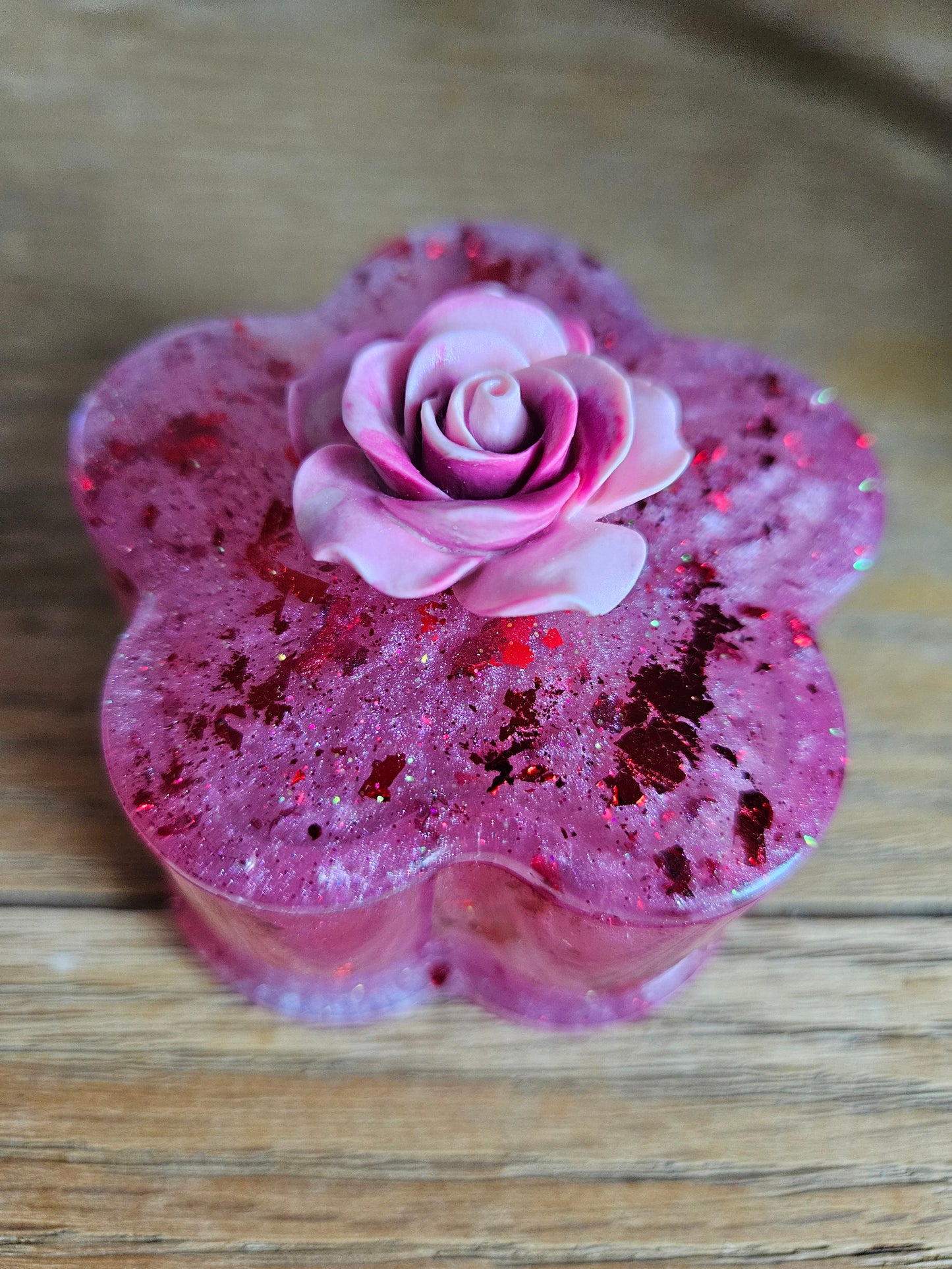 Flower shaped trinket box with rhinestones and arcylic flowers.