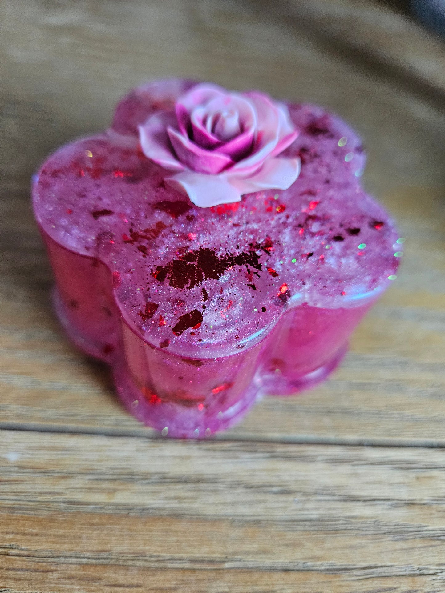 Flower shaped trinket box with rhinestones and arcylic flowers.