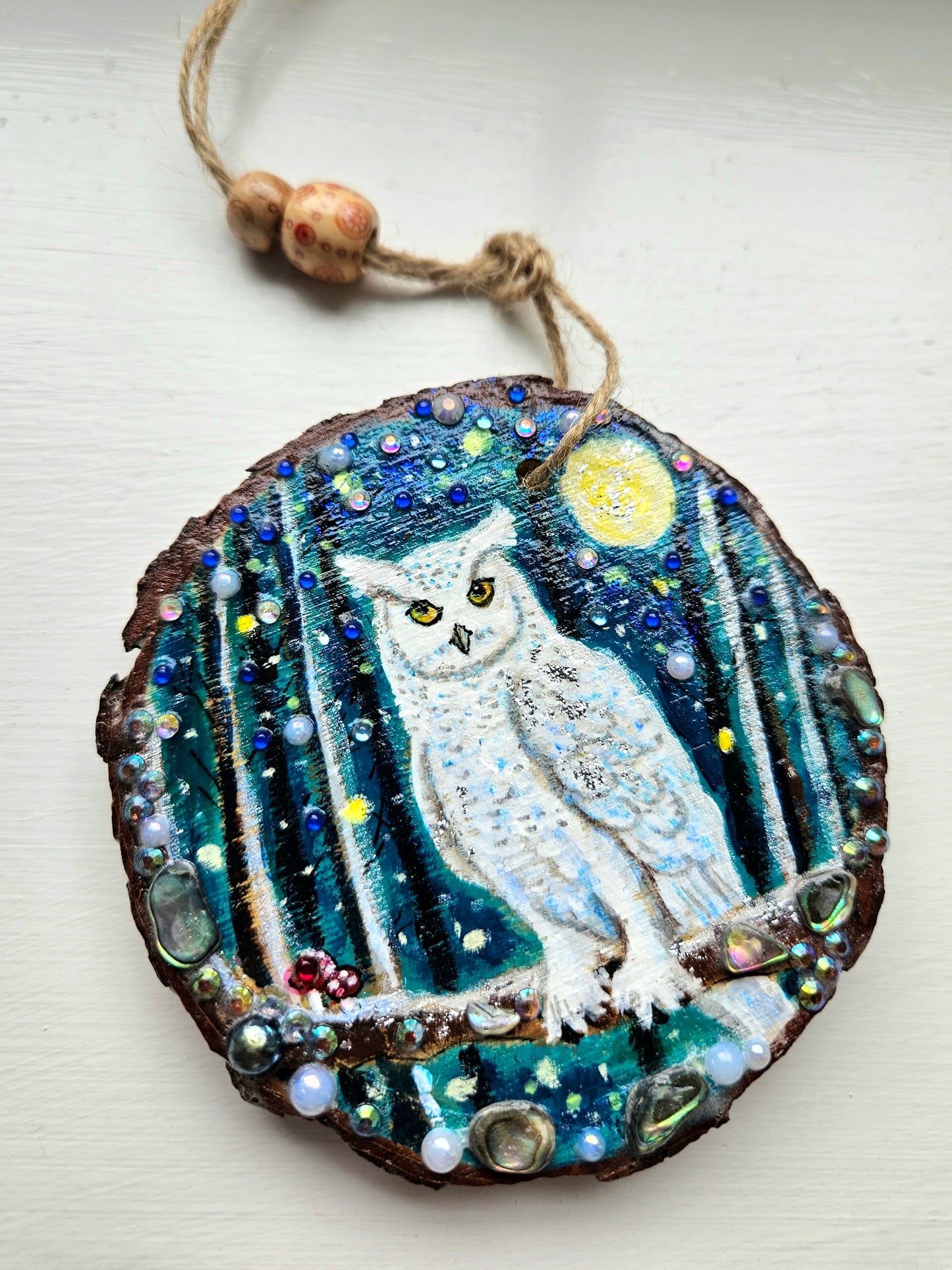 This handpainted snowy owl sitting under the moon and night sky/whimsical home decor creation/wood slice painting for animal/nature lover/unique new home gift