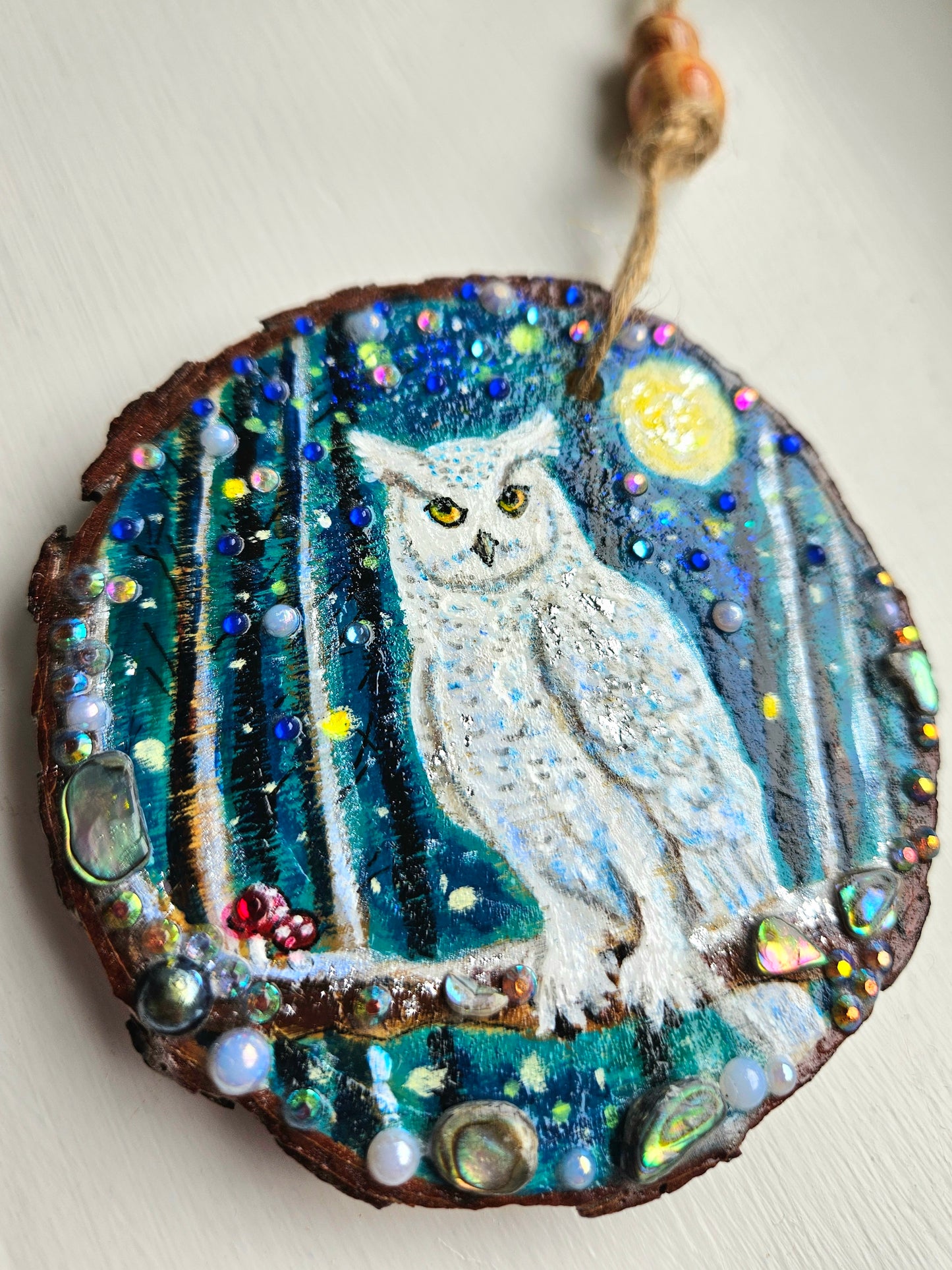 This handpainted snowy owl sitting under the moon and night sky/whimsical home decor creation/wood slice painting for animal/nature lover/unique new home gift