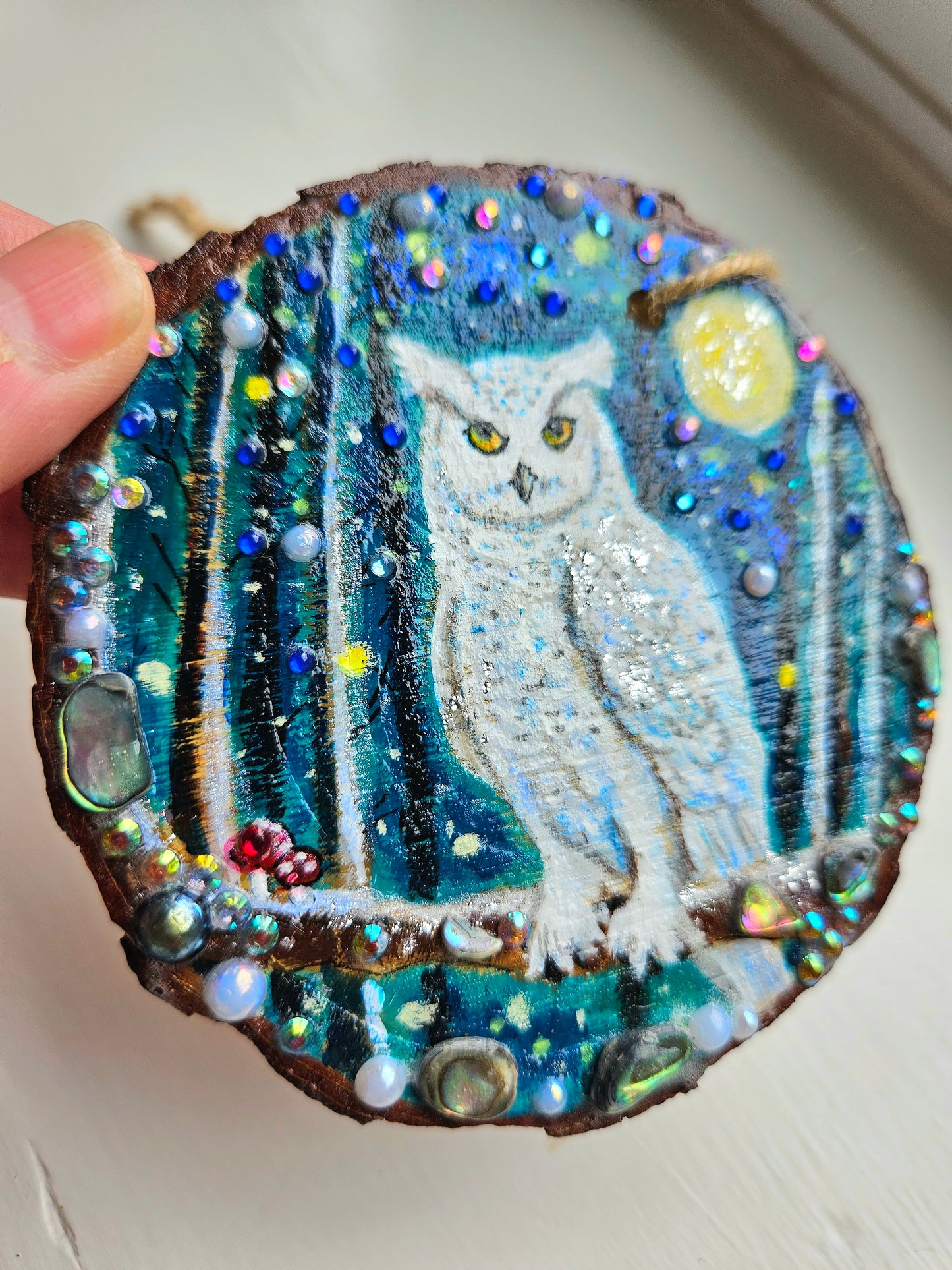 This handpainted snowy owl sitting under the moon and night sky/whimsical home decor creation/wood slice painting for animal/nature lover/unique new home gift