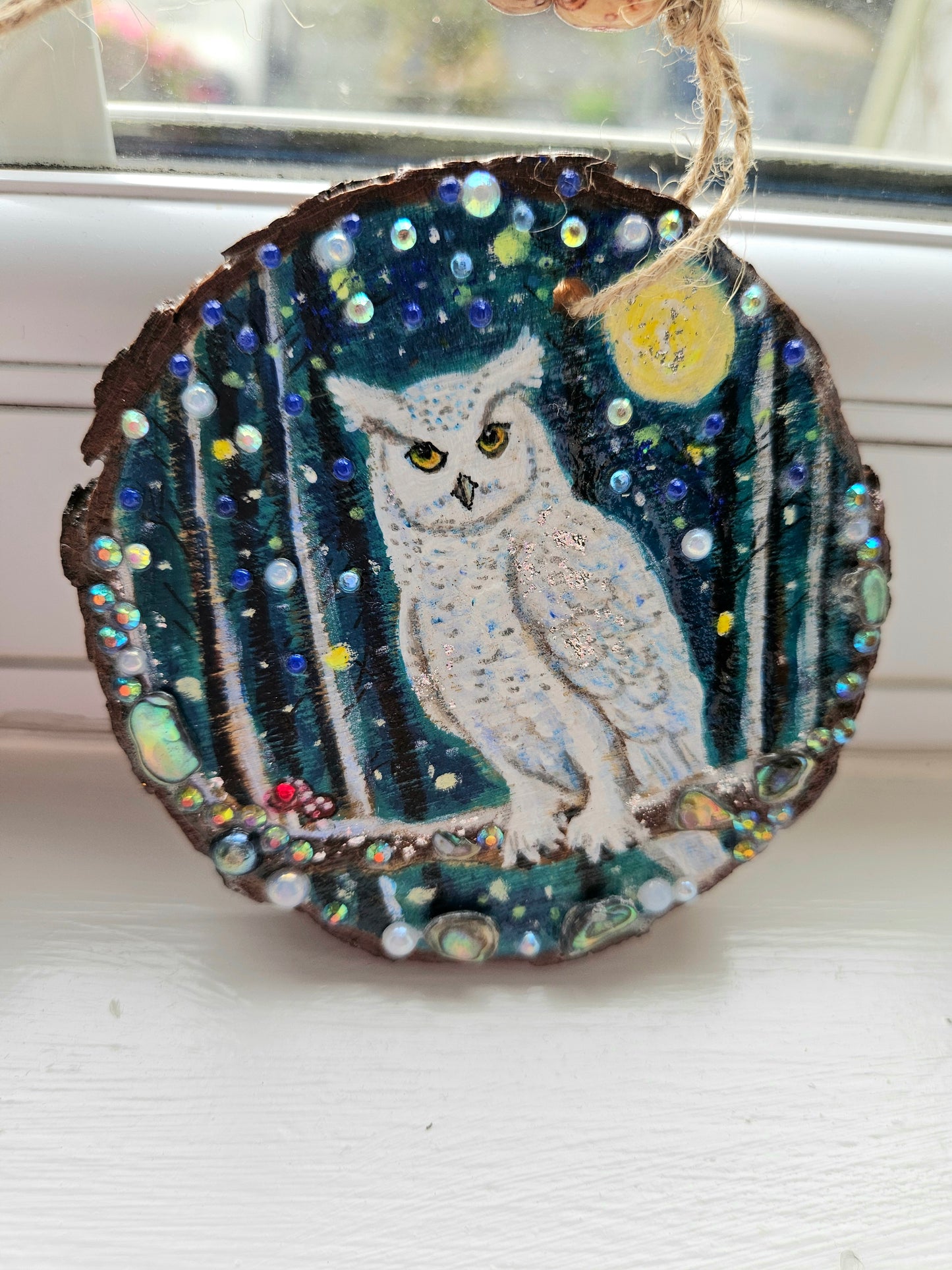 This handpainted snowy owl sitting under the moon and night sky/whimsical home decor creation/wood slice painting for animal/nature lover/unique new home gift