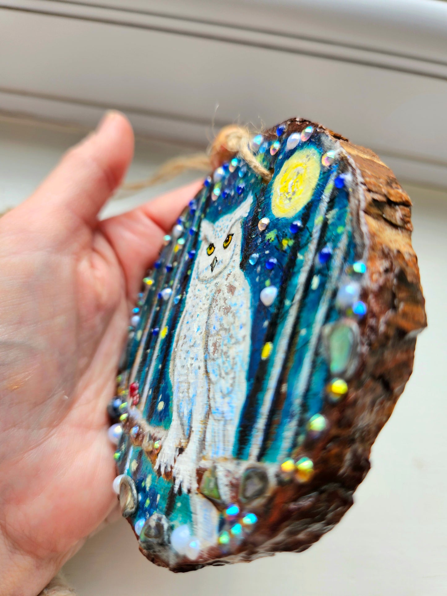 This handpainted snowy owl sitting under the moon and night sky/whimsical home decor creation/wood slice painting for animal/nature lover/unique new home gift