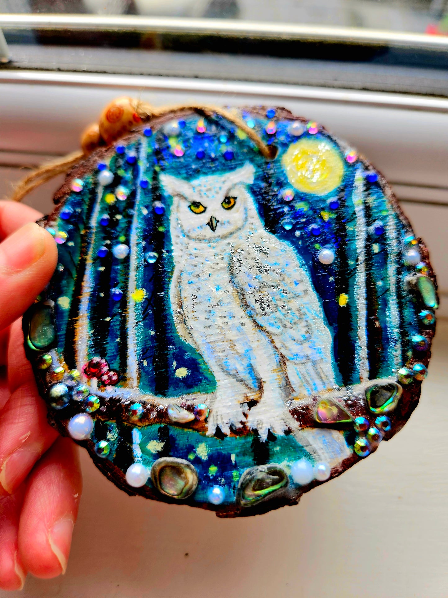 This handpainted snowy owl sitting under the moon and night sky/whimsical home decor creation/wood slice painting for animal/nature lover/unique new home gift